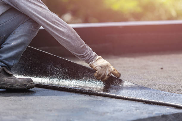 Professional Exterior Waterproofing technician working in New London, WI